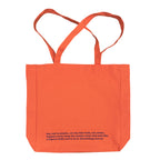 Orange tote bag with purple text