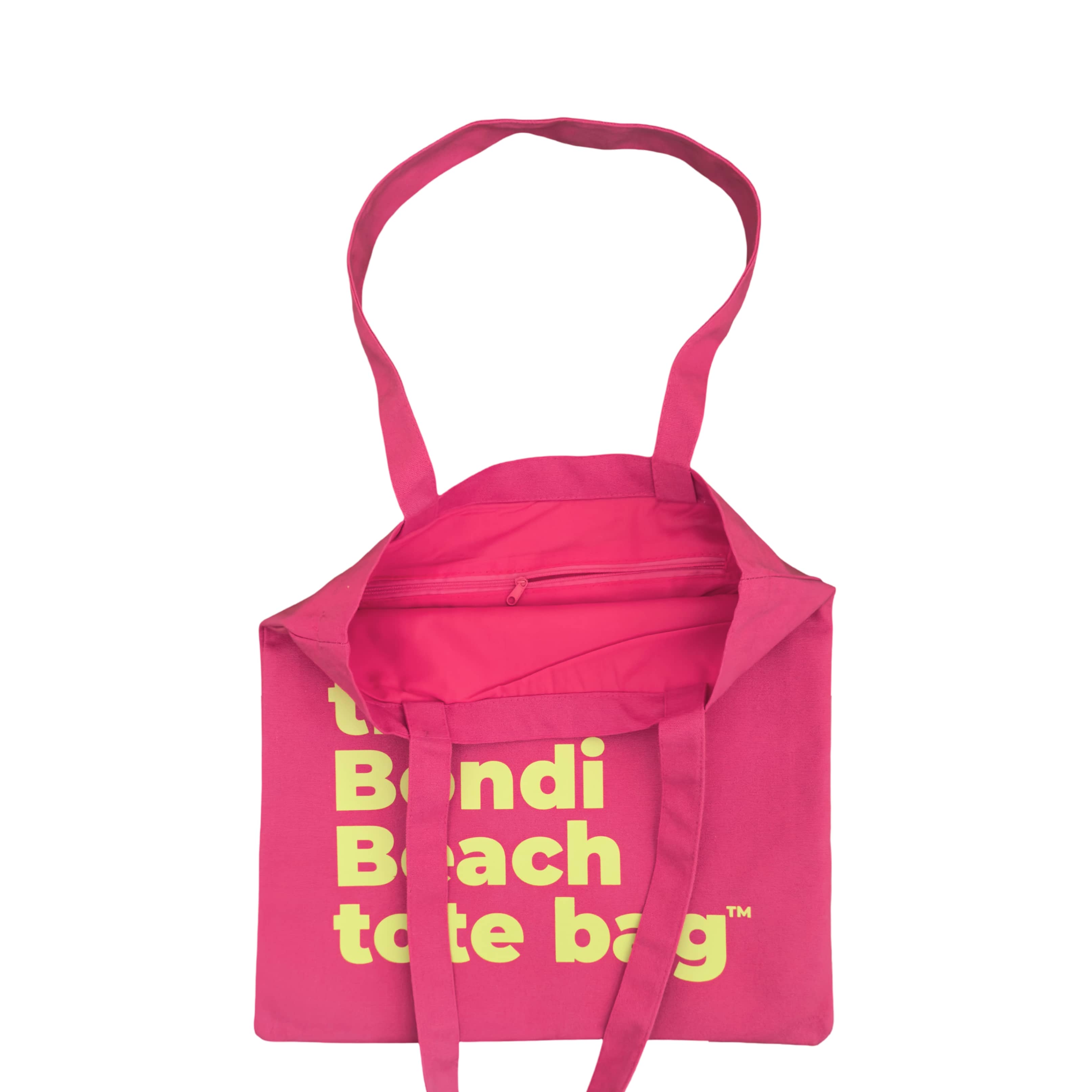 Pink tote bag with fluro green text