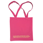 Pink tote bag with fluro green text