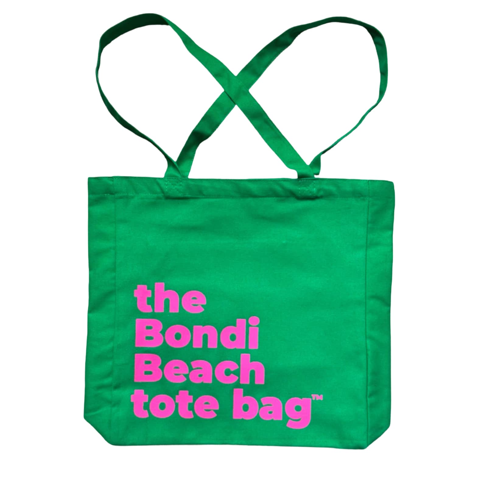 The Bondi Beach tote bag Big Bondi in green with fluro pink print flatlay closed showing bold structured canvas