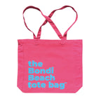 The Bondi Beach tote bag Big Bondi in pink with blue print flatlay closed showing roomy canvas structure