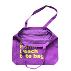 The Bondi Beach tote bag Big Bondi in purple with orange print open showing zip pocket and lining