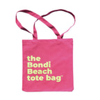 The Bondi Beach tote bag Little Bondi in pink with green print flatlay closed showing slim durable canvas