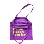 The Bondi Beach tote bag Little Bondi in purple with green print open showing zip pocket and lining